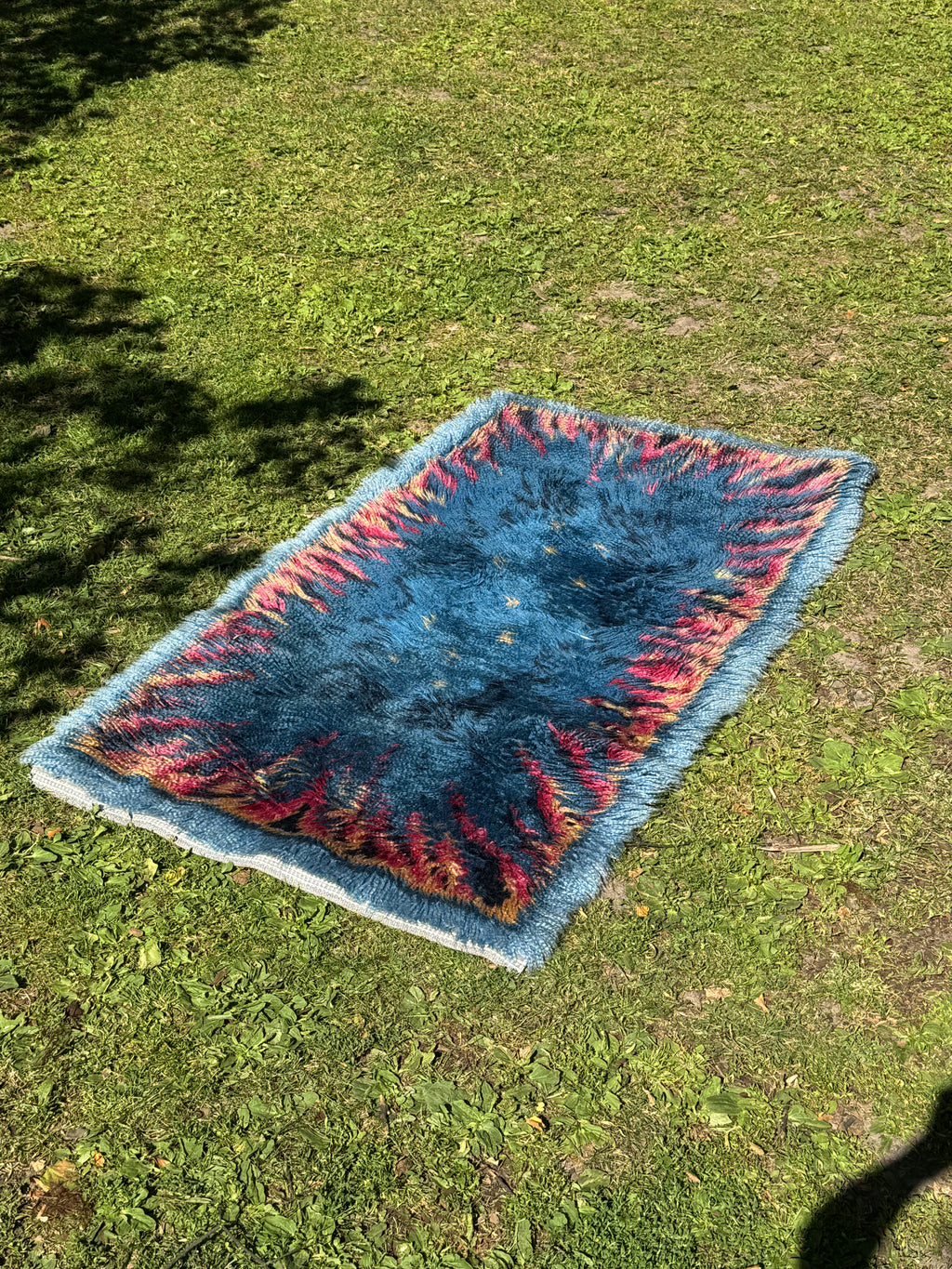 Colourful geometric rya wool rug detail