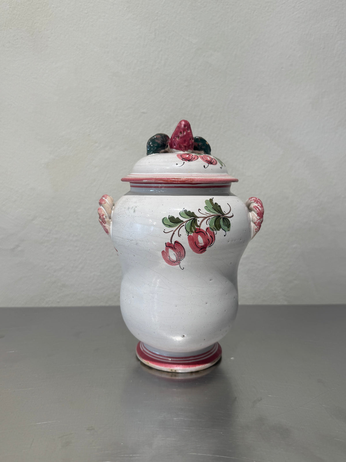 Ceramic jar with strawberry lid detail