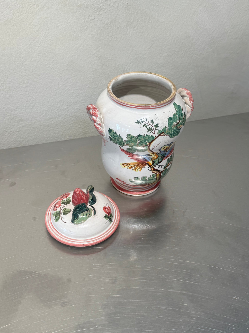 Hand-painted Italian ceramic jar close-up