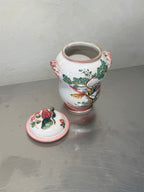 Hand-painted Italian ceramic jar close-up