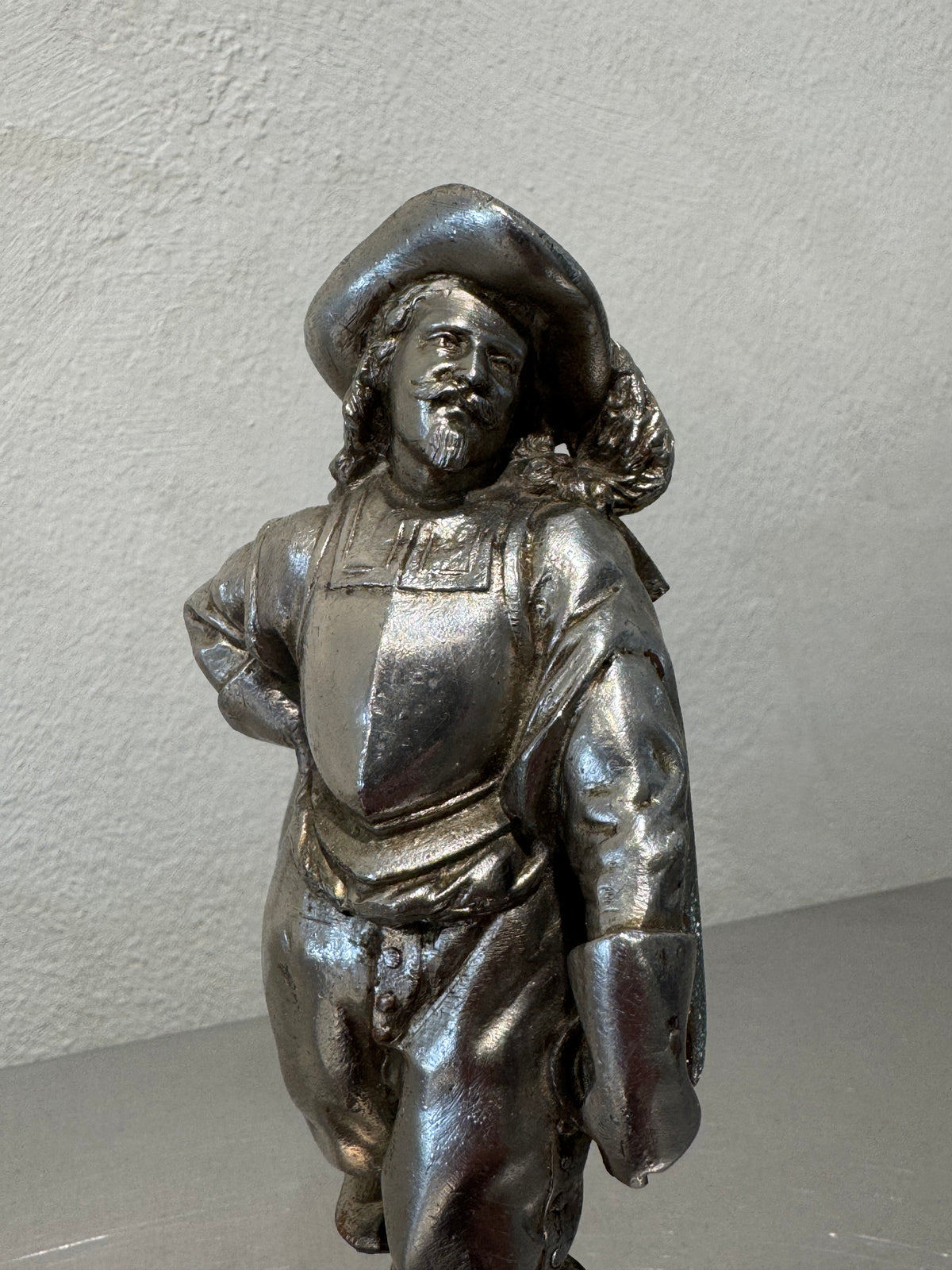 Antique decorative musketeer figure close-up