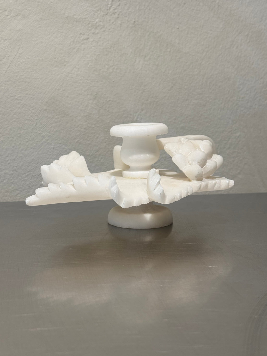 Alabaster grapevine candlestick close-up