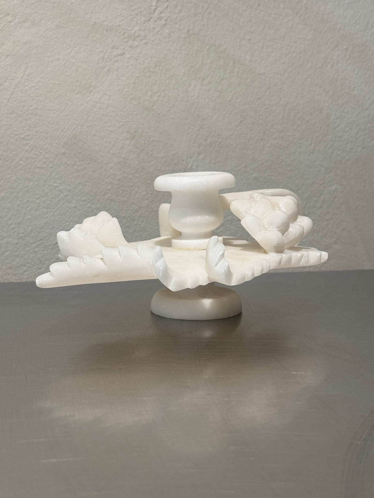 Alabaster grapevine candlestick close-up