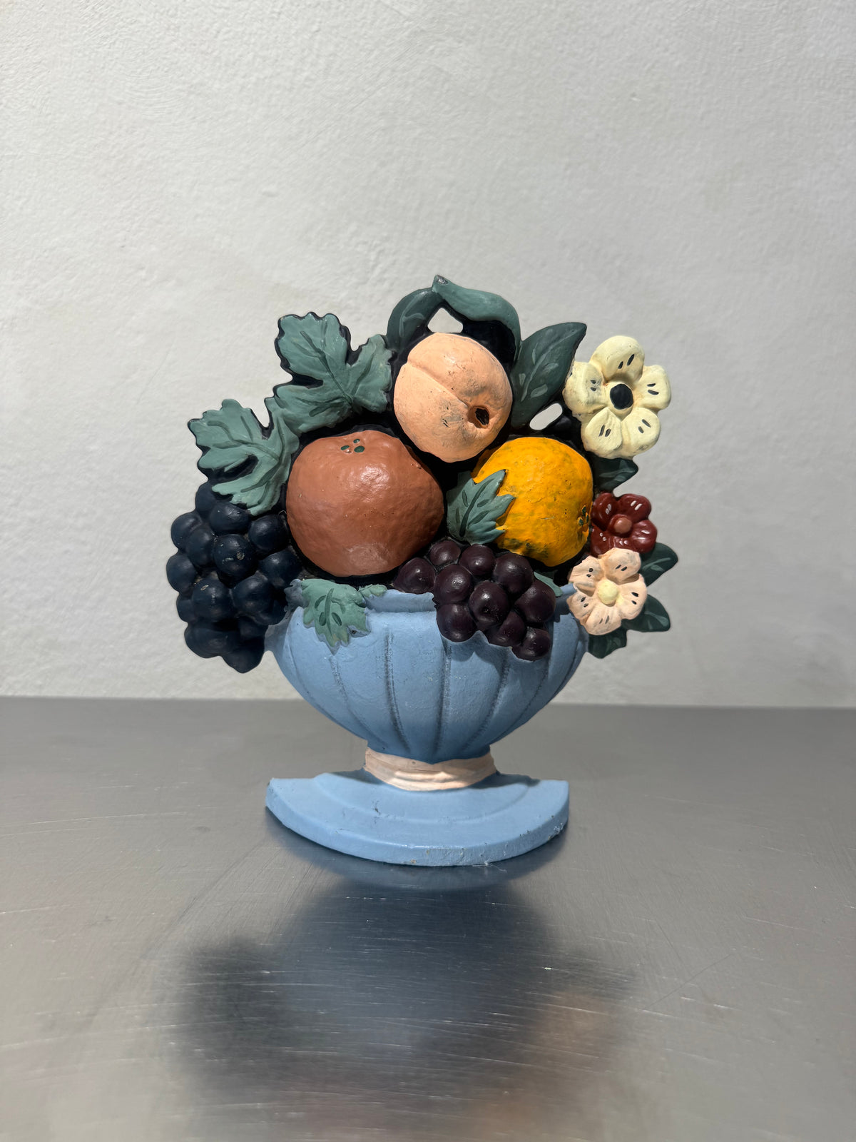 1989 hand-painted cast iron doorstop
