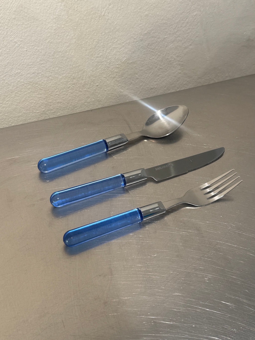 1980s cutlery set of 21 with light blue handles