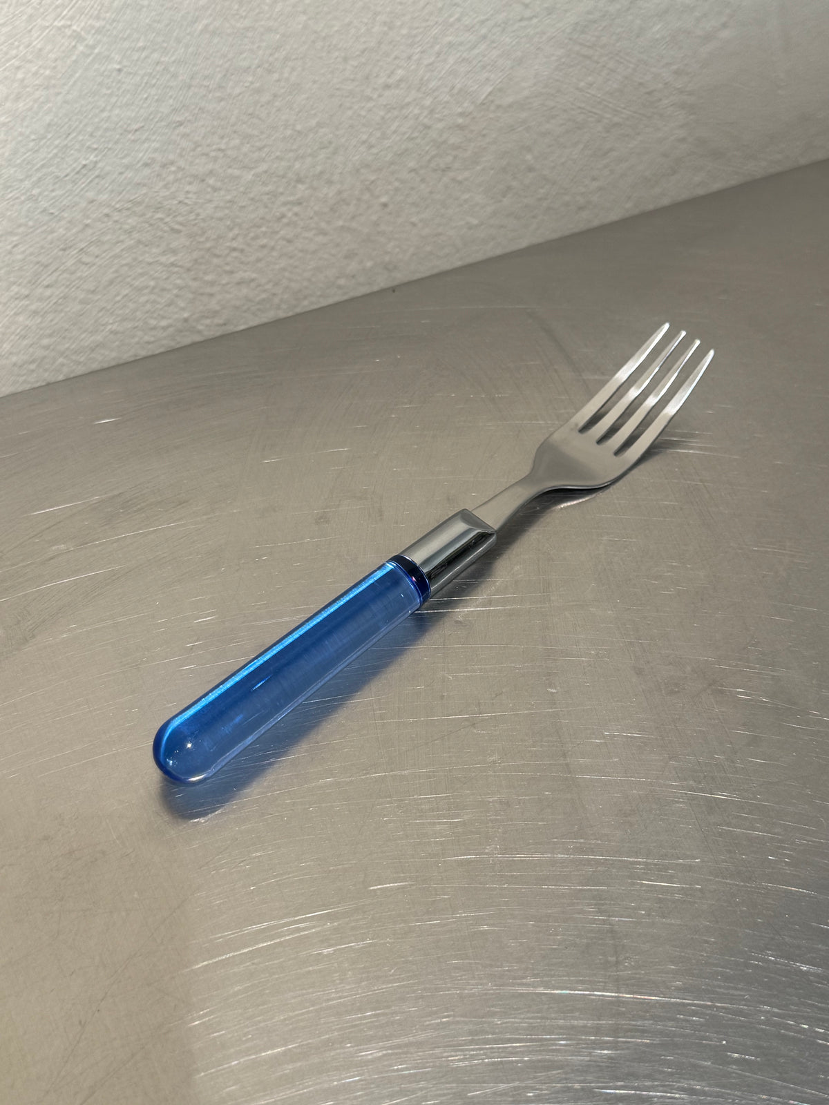 Stainless steel cutlery with blue handles, 1980s
