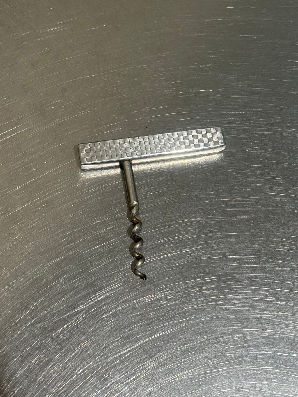 Mid-century stainless steel corkscrew detail