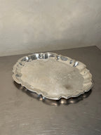 Mid-century silver-plated serving tray with ornate border