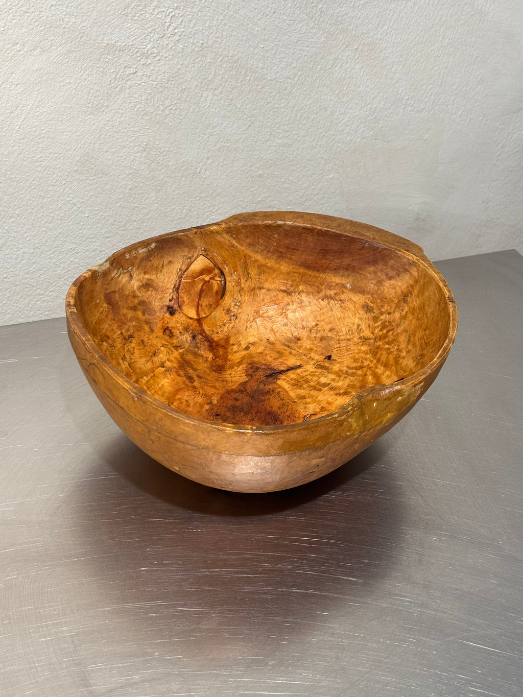 Antique folk art wooden bowl close-up