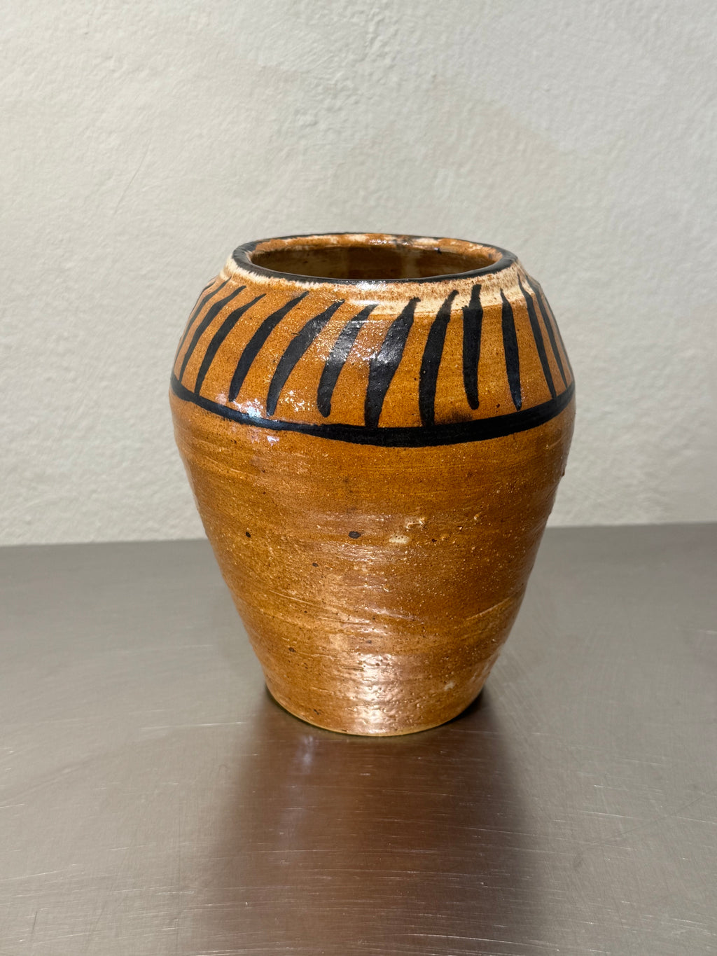 Studio pottery vase with black decoration