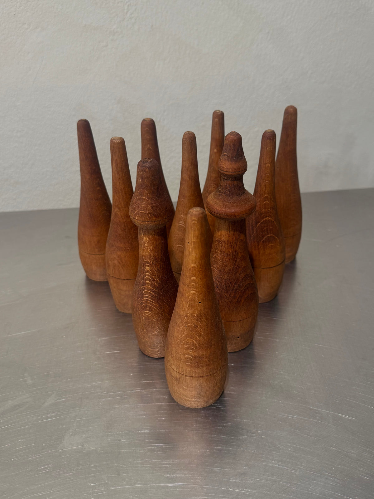 Handmade teak bowling pins and wooden ball