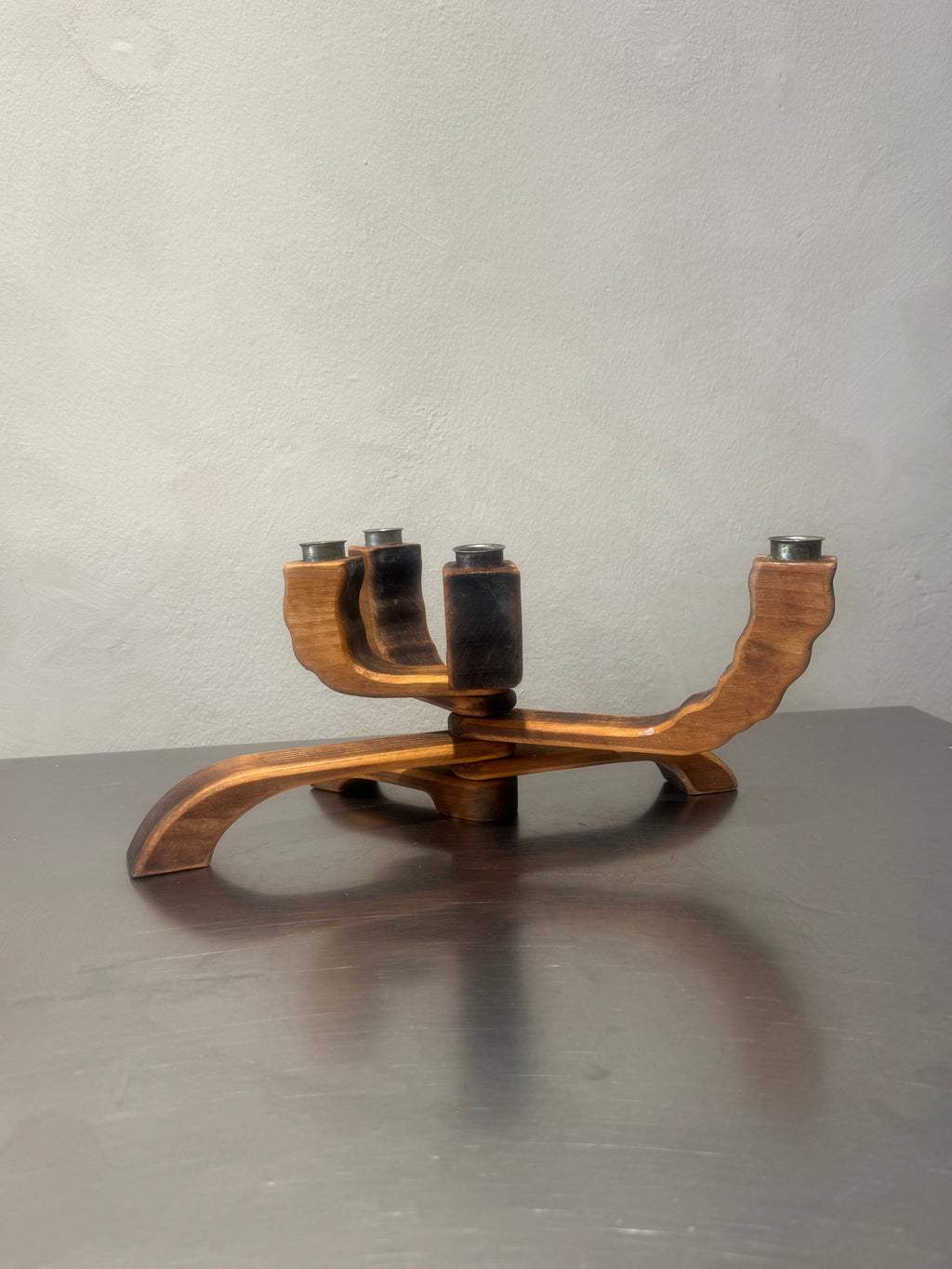 Vintage four-arm wooden candelabra side view