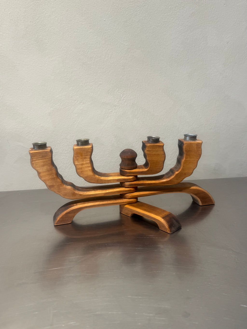 Handmade wooden four-arm candelabra