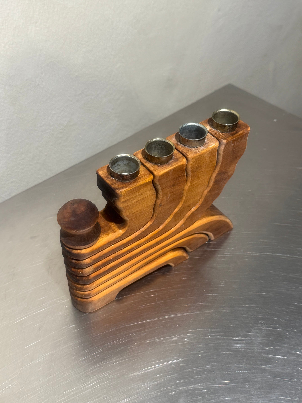 Four-arm candelabra in wood and metal