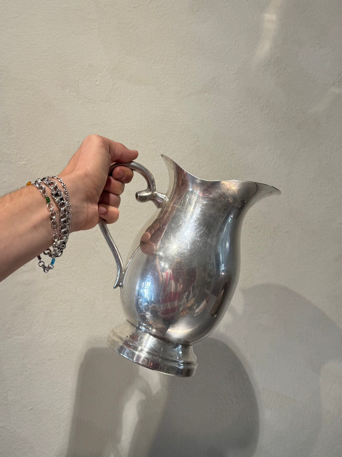 Silver-plated water pitcher with built-in strainer