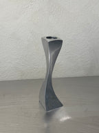 Wavy metal candlestick detail