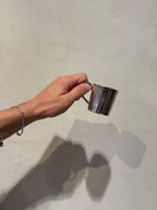 Small nickel silver cups with age-related wear