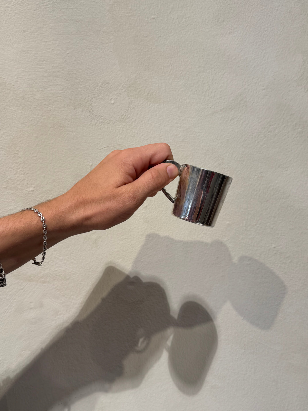 Small nickel silver cups with age-related wear