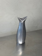 Vintage tall metal vase side view