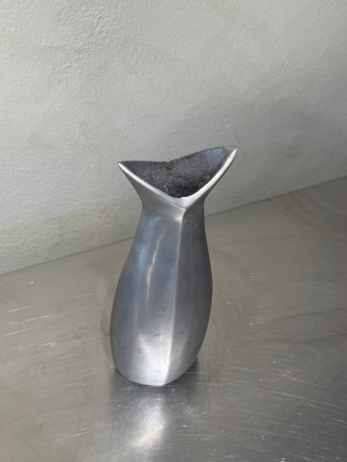 1980s metal vase with surface wear