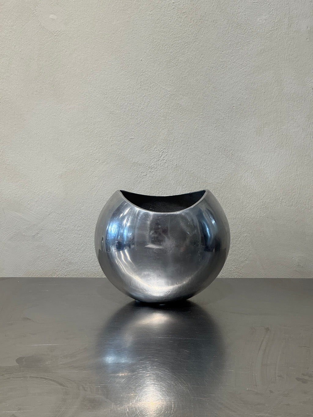 Sculptural polished metal vase from the 1980s