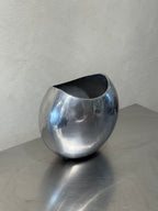 Rounded vintage polished metal vase