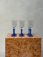 Set of six clear and cobalt blue Le Goce wine glasses