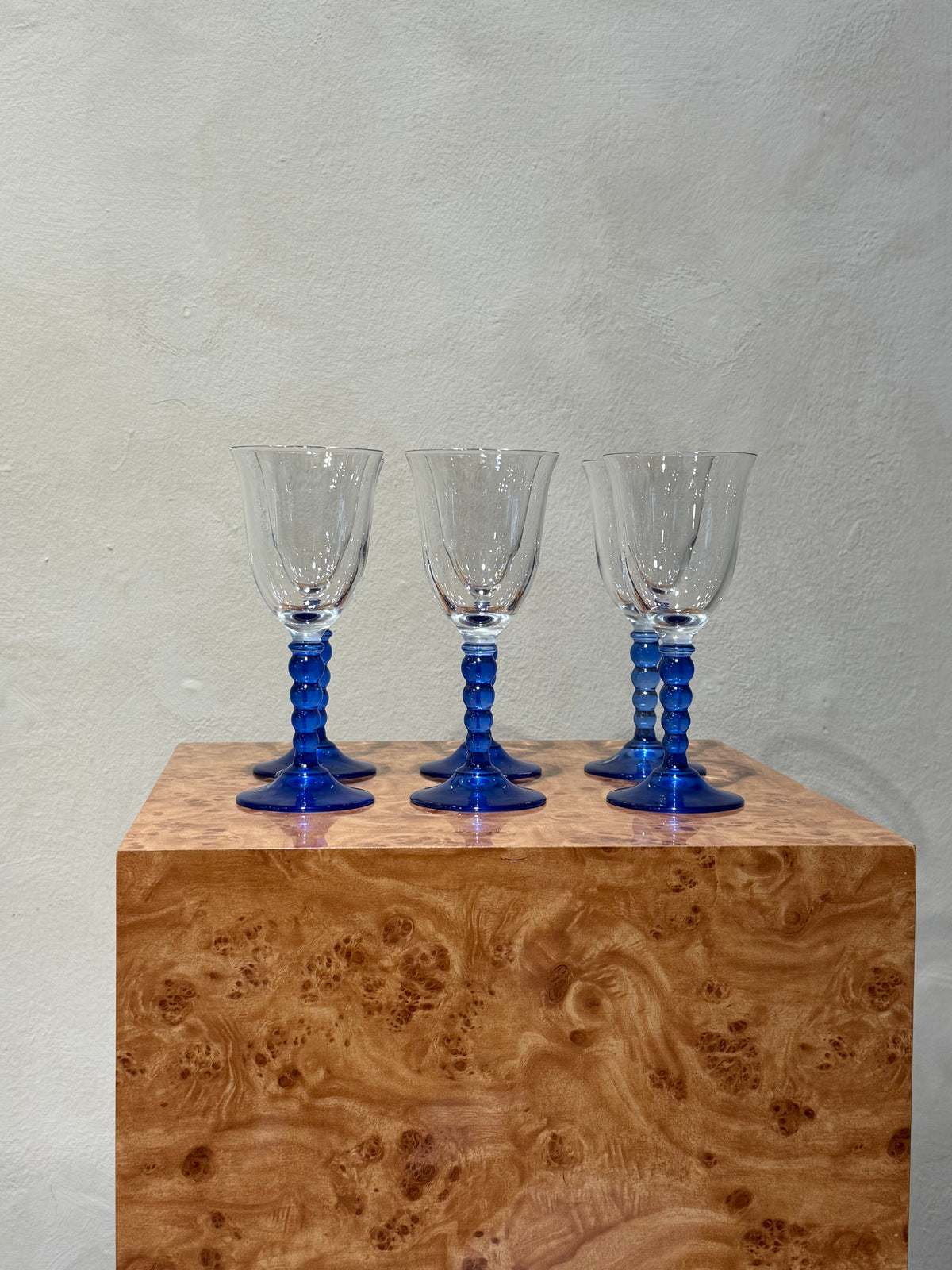 Set of six clear and cobalt blue Le Goce wine glasses