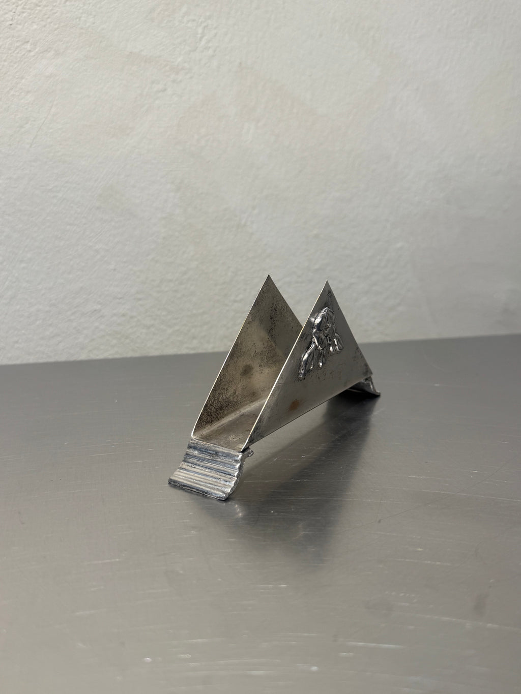 Mid-century silver-plated napkin holder side view