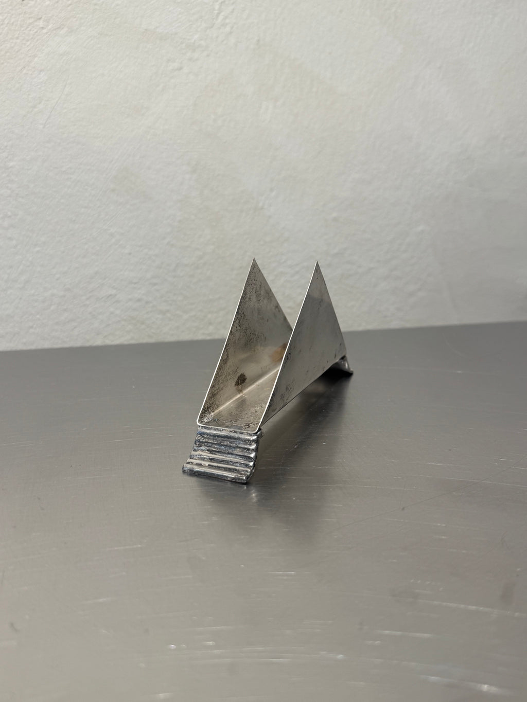 Silver-plated napkin holder detail