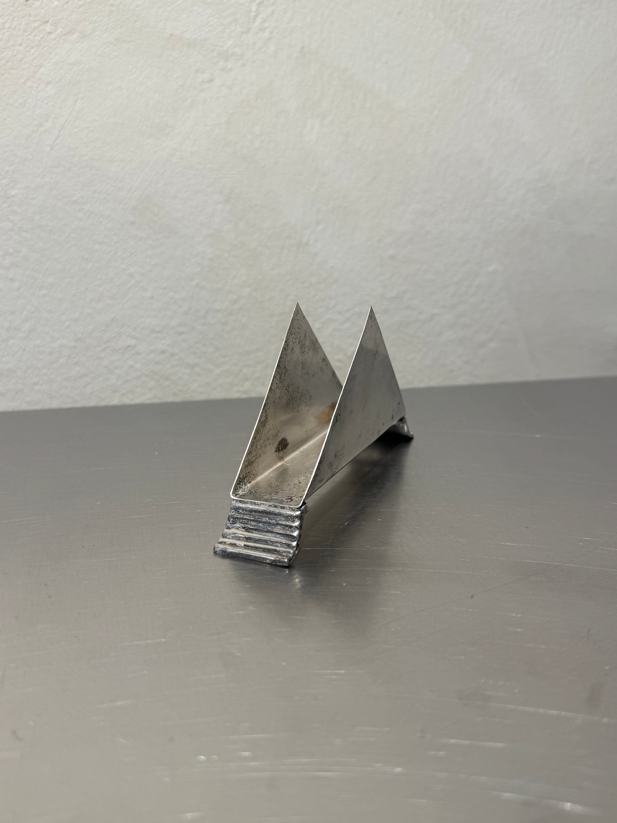 Silver-plated napkin holder detail