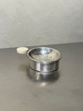 1930s silver-plated tea strainer with drip bowl