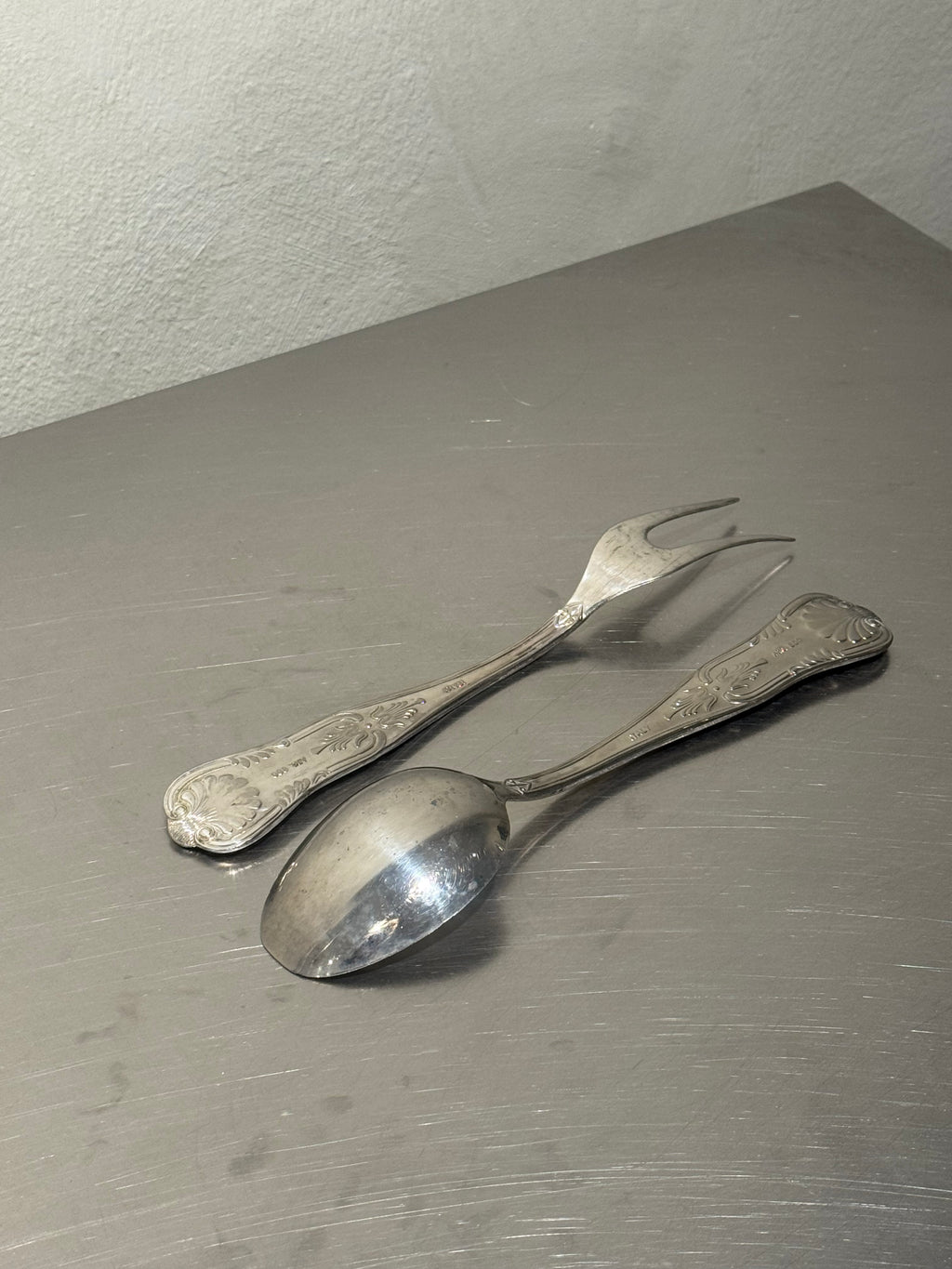 Silver-plated Italian serving fork and spoon with leaf details