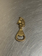 Brass horse bottle opener with patina