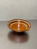 Small glazed ceramic mixing bowl with pouring lip