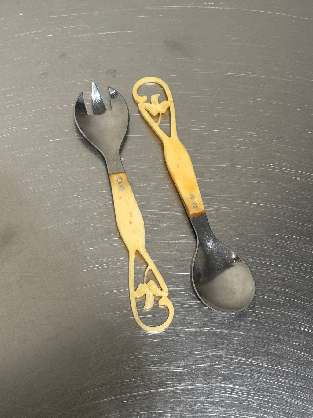 Vintage salad servers with carved bone handles