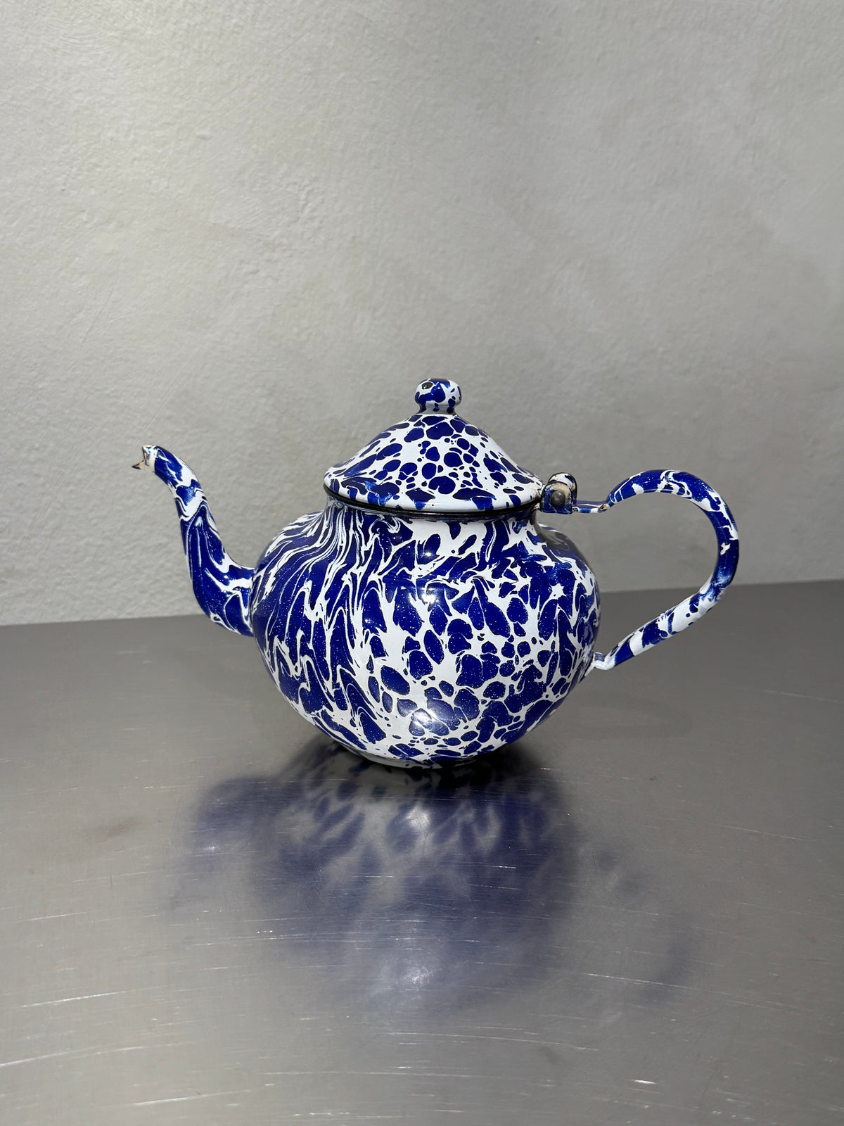 Marbled enamel teapot from late 19th or early 20th century