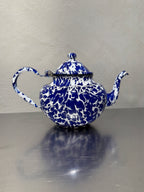 Vintage marbled enamel teapot side view