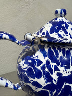 Antique marbled enamel teapot detail