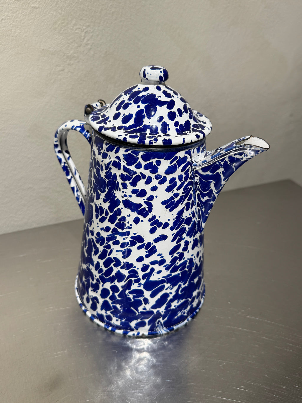 Marbled enamel coffee pot side view