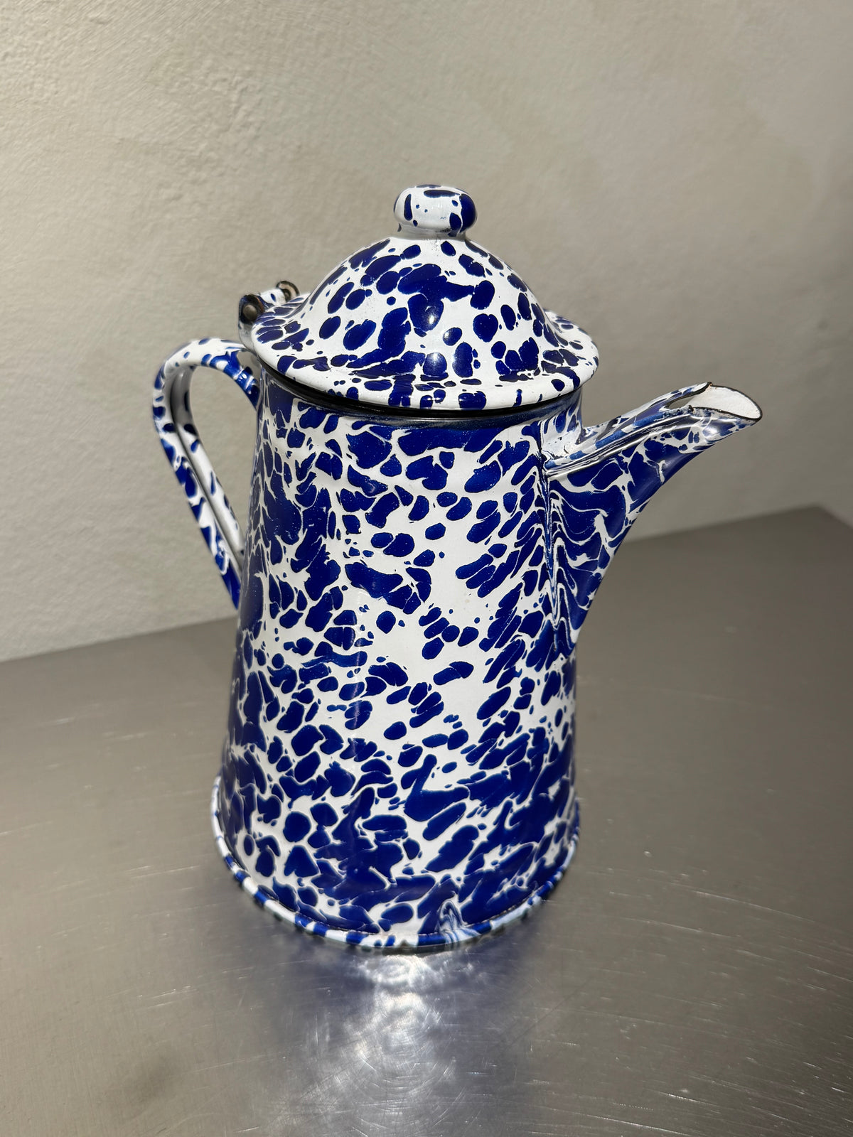 Marbled enamel coffee pot side view