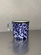 Vintage marbled enamel mug side view