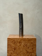 Vintage chrome vase from the 1980s, side view