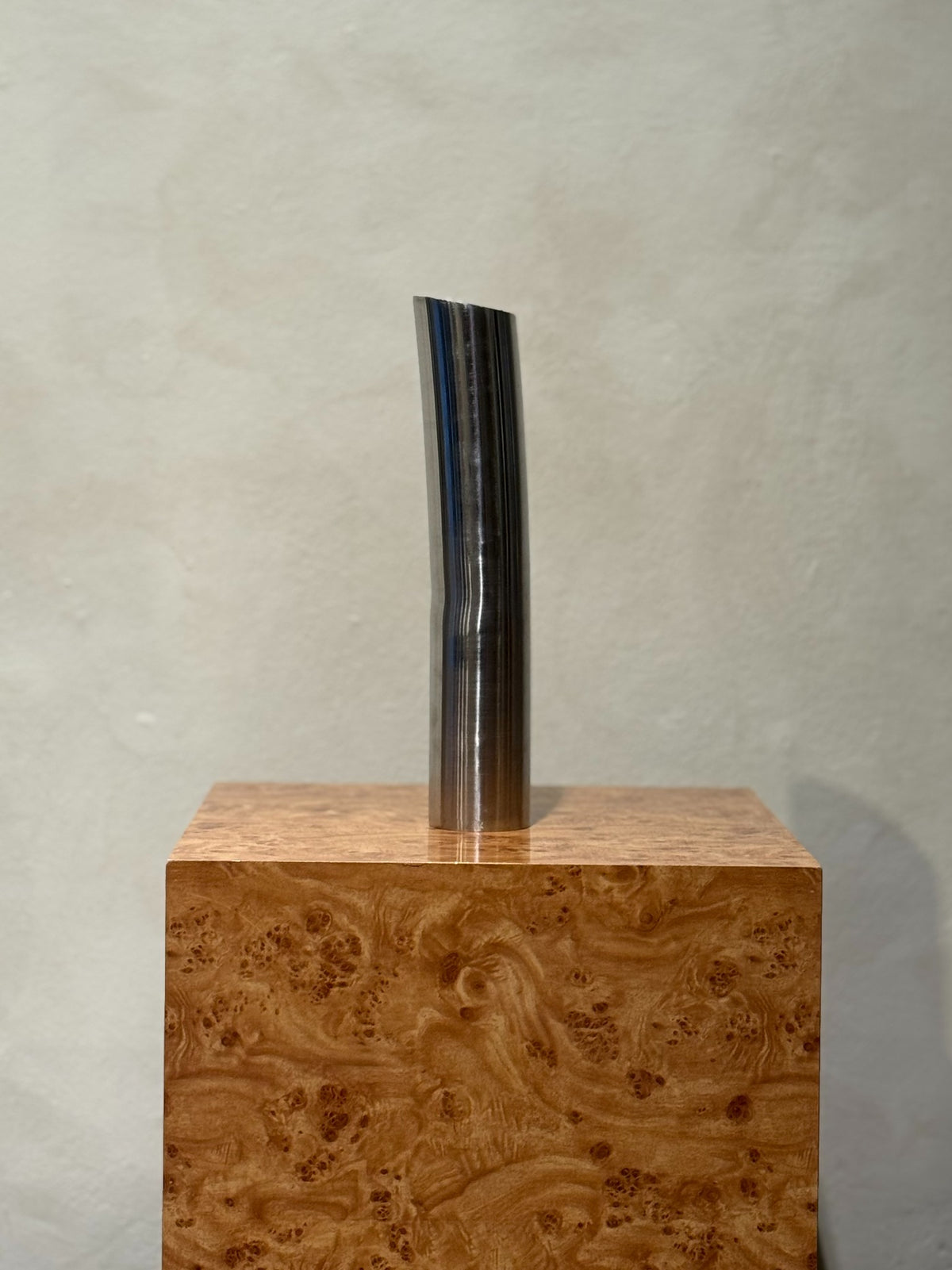 Vintage chrome vase from the 1980s, side view