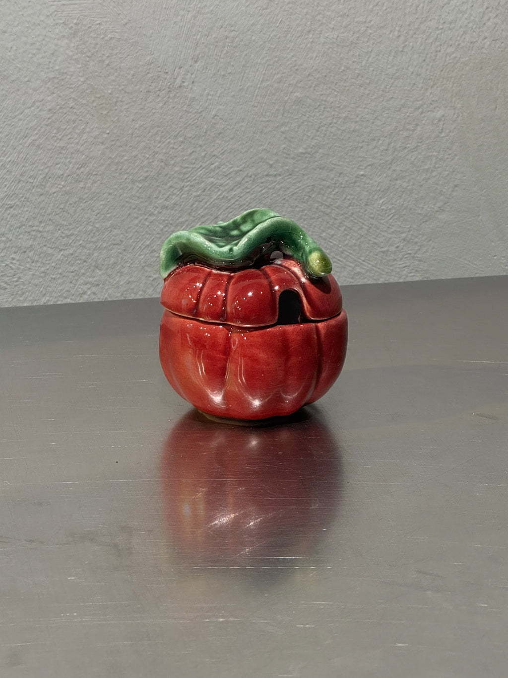 Small red tomato preserve jar