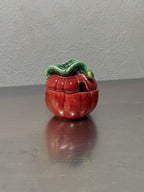 Small red tomato preserve jar
