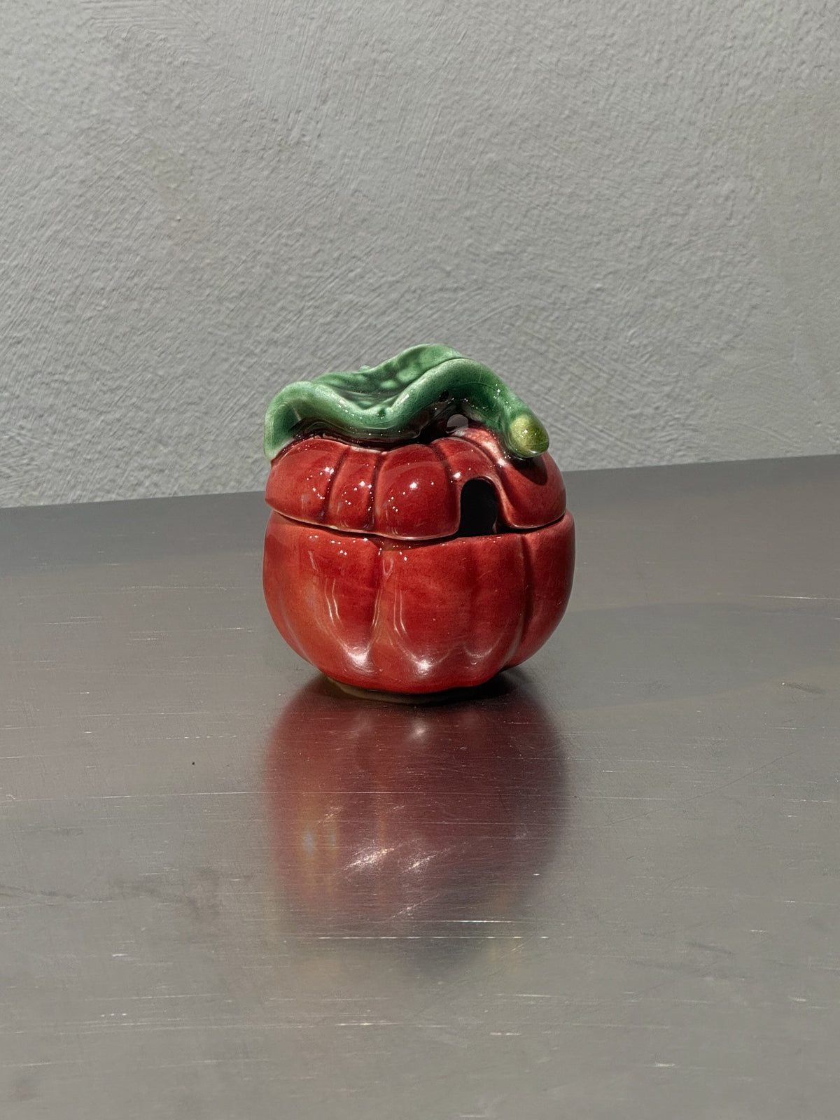 Small red tomato preserve jar