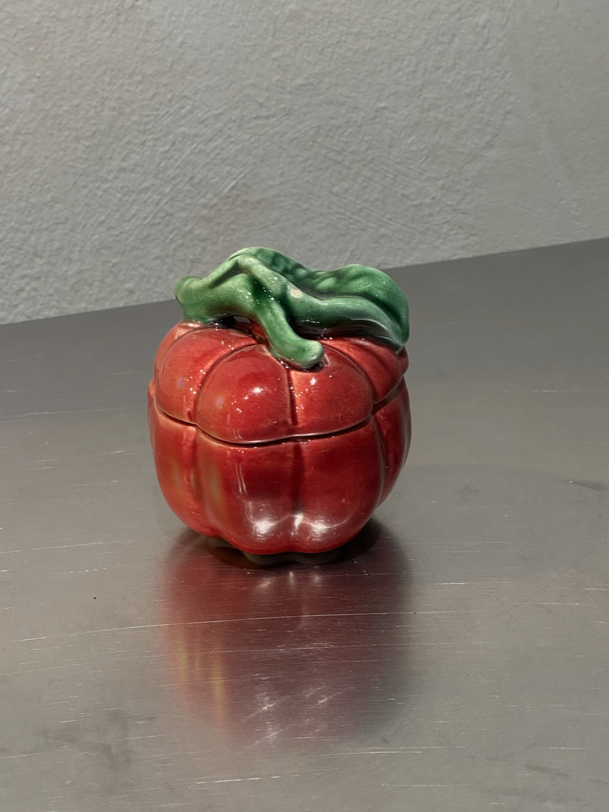 Small red tomato preserve jar