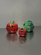 Three mid-century ceramic preserve jars