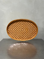 Mid-century oval rattan tray with geometric weave